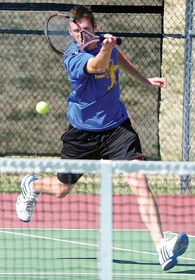 Les Stukenberg/The Daily Courier<br>Prescott’s Dylan Darr hits a return shot during the Badgers’ AIA state team tennis tournament opener against Mingus Tuesday at PHS.