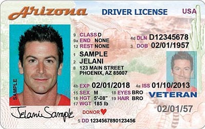The Associated Press<br>The Arizona Motor Vehicle Division’s current driver license, bottom, will soon be replaced by a newly designed license, top. The changes include a larger photo, a laser perforation shaped like Arizona, and a raised date of birth imprint to make the cards harder to forge and easier to identify.