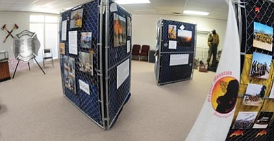 Les Stukenberg/The Daily Courier<br>Granite Mountain Hotshot Memorial kiosks will be on display in the ballroom of the Hotel St. Michael at 205 West Gurley Street beginning Sunday.