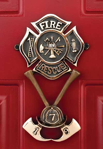 Courtesy photo<br>
Chino Valley artist Dennis Taylor created this brass door knocker to honor the 19 Granite Mountain Hotshots.
