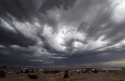 Padraig Houlahan/Courtesy photo<br>Stormclouds gather over Chino Valley, signalling the start of monsoon season.
