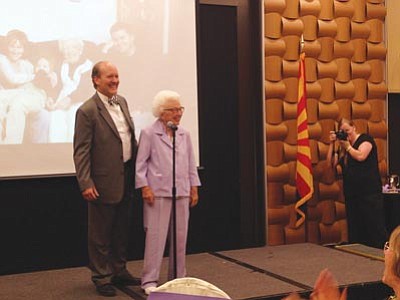 Douglas Emmett/Courtesy photo<br>Jerry Emmett stands with her grandson Bert Emmett, who was master of ceremonies at a party honoring her on her 100th birthday recently.
