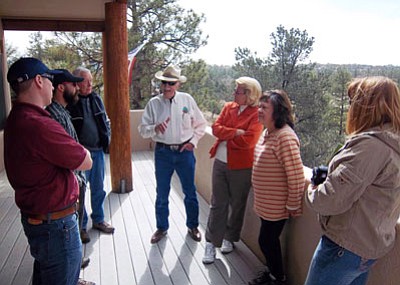 Glen Buettner, ASFD/Courtesy photo<br>
Gary Roysdon, wearing his usual cowboy hat, talks to PAWUIC members about hazardous fuels mitigation during a field trip in March.