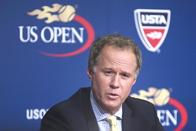 John Minchillo/The Associated Press<br>Patrick McEnroe announces his resignation as the U.S. Tennis Association’s general manager of player development, at a news conference at the U.S. Open, Sept. 3 in New York. The change comes during a tournament in which no American men reached the round of 16 for the second year in a row - something that, until 2013, had never happened at an event that began in 1881.