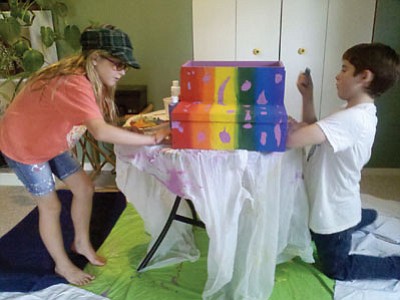 Courtesy photo<br>
Sophie Maxwell-Trott and Logan Herbert paint a WIC stepstool. Step Up for Kids, a local nonprofit, has recently partnered with the local WIC program on the stools. Step Up for Kids, and the non-profit ComMusiKey, will hold a community picnic on Saturday, Sept. 27, beginning at noon.
