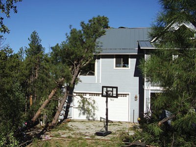 Several homes in the Groom Creek area south of Prescott were damaged by Saturday’s final monsoon storm of the season. (Yavapai County Development Services Department/Courtesy photo)