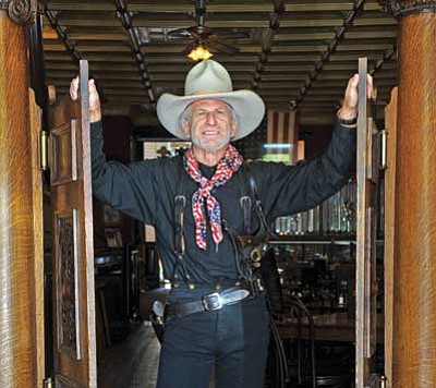 Dave Michelson owns the Palace Saloon and Restaurant on Whiskey Row in downtown Prescott, which made USA Today’s “Ten Best Bars That Serve Up History, Neat.” (Matt Hinshaw/The Daily Courier)