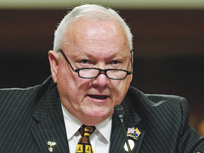 In this April 24, 2012, file photo, then-Arizona state Sen. Russell Pearce, the architect of Arizona’s controversial immigration law SB1070, testifies on Capitol Hill in Washington. (J. Scott Applewhite/Associated Press, file photo)