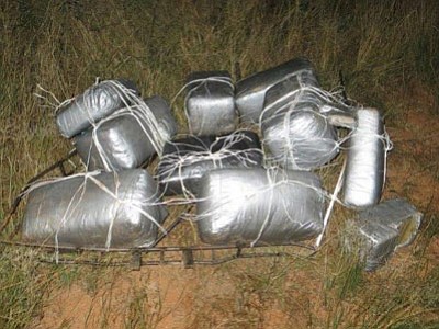 This photo provided by the U.S. Customs and Border Protection shows nearly 185 pounds of marijuana recovered after an ultralight aircraft was seen flying from Mexico into southeastern Arizona. (Associated Press photo/U.S. Customs and Border Protection)