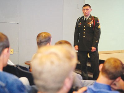 Dewey resident Brandon Corrales talks to Chino Valley High School students about his time in military service. (Les Stukenberg/The Daily Courier)