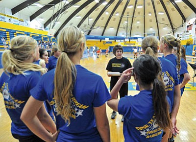 Matt Hinshaw/The Daily Courier<br>Prescott volleyball coach Shellie Bowman talks tactics with her players during preseason practice back on Aug. 21 at PHS.