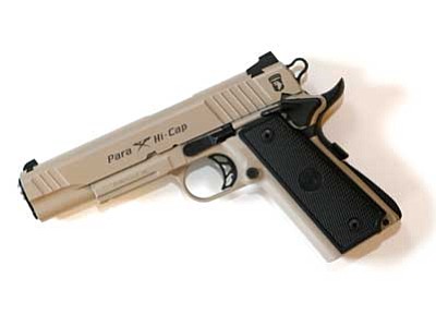 The Associated Press<br>
Above is a Para 1911 .45-caliber tan handgun, similar to the fake handgun – below – taken from 12-year-old Tamir Rice, who was fatally shot by Cleveland police in Cleveland. The 12-year-old was shot at a city park after he reportedly pulled the Colt 1911 replica on arriving officers.