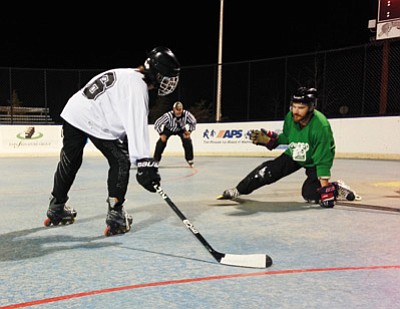 Courtesy photo<br>Monte Drenttel of Team Red Bull scores one of his two goals as the Goonies’ Jesse Meckley defends.