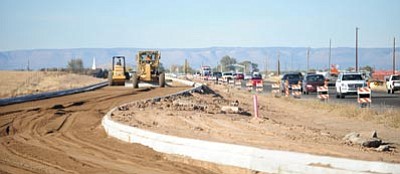 Les Stukenberg/The Daily Courier<br>
Heavy equipment works on what will eventually be the southbound lanes of Highway 89 as work progresses Thursday.