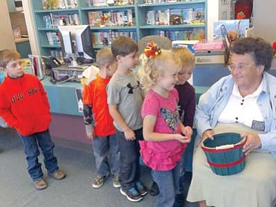 Courtesy photo<br>
Mrs. Margaret Bethke volunteers regularly in the library of the Kinder Center.