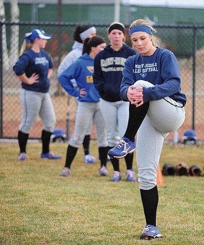 Les Stukenberg/The Daily Courier<br>Embry-Riddle softball’s Brooke Eifert-Pancamo stretches out during practice Monday afternoon at the Prescott campus.