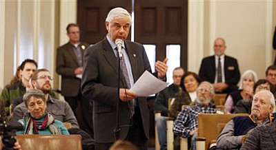 State Sen. Jeb Bradley, R-Wolfboro speaks in favor of a bill during a public hearing on a bill that would allow anyone to carry a concealed weapon without a license on Thursday, Jan. 29, 2015 at the Statehouse in Concord, N.H.,. (AP Photo/Jim Cole)