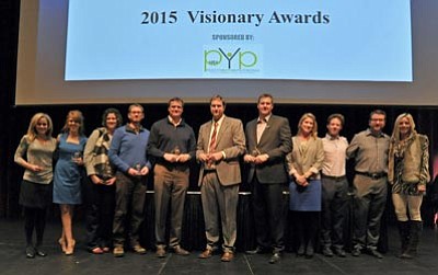 Matt Hinshaw/The Daily Courier<br>
Recipients of the Prescott Area Young Professionals 2015 Visionary Award gather for a photo with the Core Leadership Group Thursday afternoon.