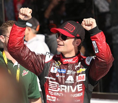 Stephen M. Dowell/Orlando Sentinel, AP<br>Jeff Gordon celebrates after posting the fastest time to win the pole position during qualifying for the Daytona 500 on Sunday, Feb. 15, 2015.