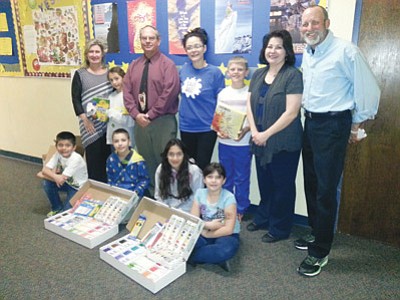 Courtesy<br /><br /><!-- 1upcrlf2 -->Photo courtesy of Prescott SpringHill Suites <br /><br /><!-- 1upcrlf2 -->Miller Valley Elementary School art students show their new supplies. Front row: Angel, Aiden, Melissa and Haley.  Back row:  Margo Christensen, Ponderosa Hotel Management; Tala, student; Principal Jeff Lane; Alondra, SpringHill Suites; Briley, student; Christine Dean, art teacher; and JL Jernegan, SpringHill Suites general manager.<br /><br /><!-- 1upcrlf2 -->