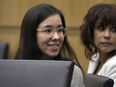 The Associated Press, pool, file photo<br>Jodi Arias looks toward family members during the sentencing phase of her retrial at Maricopa County Superior Court, on Feb. 24, in Phoenix.