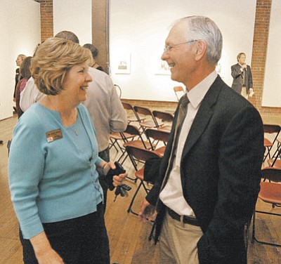 Matt Hinshaw/The Daily Courier<br /><br /><!-- 1upcrlf2 -->Prescott College President John Flicker talks with Yavapai College President Dr. Penny Wills Wednesday March 18 at the Sam Hill Warehouse during the college's "Meet Our New President" event.  Flicker was the President of National Audubon Society and Vice President of The Nature Conservancy before coming to Prescott.