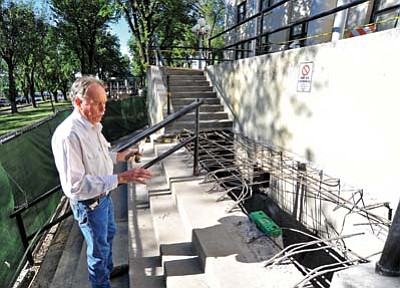 Matt Hinshaw, file/The Daily Courier<br>Bill Otwell of Otwell Associates Architects talks about the repair work in July 2014 on the west side staircase of the courthouse in downtown Prescott.

