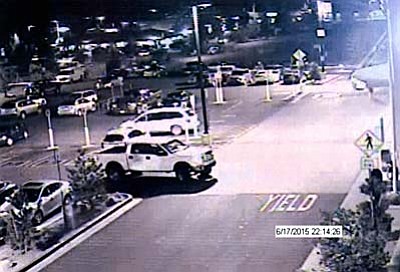 An surveillance camera image shows the truck police believe dropped off the males suspect and driven by a blonde female.