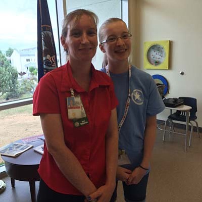 NAVACHS Public Affairs Officer Mary Dillinger with her junior volunteer daughter, Julia, 14. Dillinger and her husband, Josh, are both U.S. Army veterans who are employed at the VA.