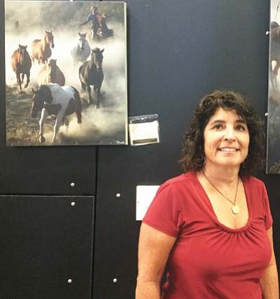 Trib Photo/Briana Lonas<br>Artist Jody L. Miller captures the essense of horses with her Western fine art photography business. Her work is on display at the Prescott Valley Public Library until Aug. 6.