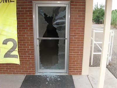Courtesy photo<br>
A glass door on a vacant building next to the Congress Grocery store was shattered.