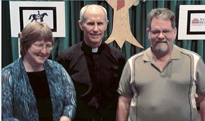 Courtesy photo<br>Pastor Kirk Anderson, center, of Emmanuel Lutheran Church in Prescott Valley with two of Emmanuel’s new liturgists, Gail Kenny and Bob Frey.
