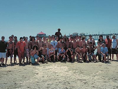 Courtesy photo<br>
Bradshaw Mountain High’s football team traveled to Irvine, California, July 20-24, for its annual training camp. Included in the players’ and coaches’ activities was time spent bonding on Huntington Beach, as shown here.