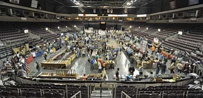 Matt Hinshaw/The Daily Courier<br>Vendors and patrons fill the Prescott Valley Event Center at the most recent for Arizona Peacemaker Gun Show in Prescott Valley.