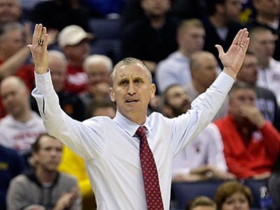 Tony Dejak, file/The AP<br>
In this March 20 file photo, then-Buffalo head coach Bobby Hurley reacts to a call in an NCAA tournament Round of 64 game in Columbus, Ohio. Hurley is now coach for Arizona State.