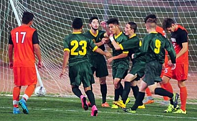 Les Stukenberg/The Daily Courier<br /><br /><!-- 1upcrlf2 -->Yavapai players celebrate their first goal as the Roughriders take on Pima Community College Saturday evening in Prescott Valley.