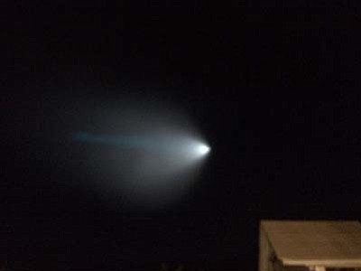 A light from a Navy unarmed missile is seen over Thousand Oaks, Calif., Saturday, Nov. 7, 2015. The Navy fired an unarmed missile from a submarine off the coast of Southern California on Saturday, creating a bright light that streaked across the state and was visible as far away as Nevada and Arizona. (Eddy Hartenstein/Los Angeles Times via AP