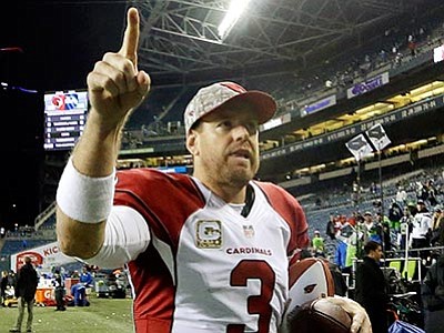 Elaine Thompson/The AP<br>
Cardinals quarterback Carson Palmer leaves the field after a game against the Seattle Seahawks, Sunday, Nov. 15. The Cardinals beat the Seahawks 39-32.