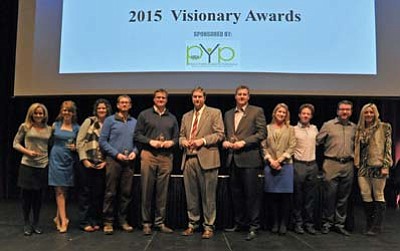 Recipients of the Prescott Area Young Professionals 2015 Visionary Award gather for a photo with the Core Leadership Group Jan. 29 during the Prescott Chamber of Commerce Annual Meeting. (Matt Hinshaw/The Daily Courier, file)