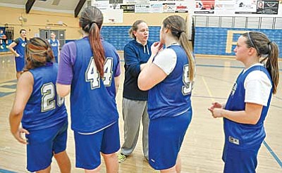 Matt Hinshaw/The Daily Courier<br>Prescott girls basketball head coach Bobbi Yoder talks with her players during a drill Tuesday evening at Prescott High School. The 2015-16 season will be Yoder’s first year as the head coach at PHS.