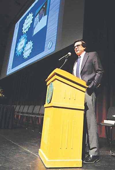 Les Stukenberg/The Daily Courier<br /><br /><!-- 1upcrlf2 -->Incoming Board Chairman Mike Fann speaks about his goals for the organization during the annual meeting for the members of the Prescott Chamber of Commerce Thursday at the Yavapai College Performance Hall.