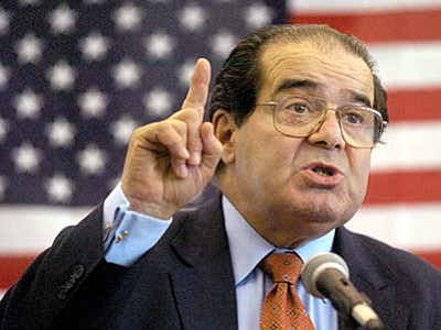 Gavin Averill/The Hattiesburg American via AP<br>
U.S. Supreme Court Justice Antonin Scalia speaks in 2014 to Presbyterian Christian High School students in Hattiesburg, Mississippi. On Saturday, Feb. 13, the U.S. Marshals Service confirmed that Scalia has died at the age of 79.