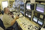 Courier/Jo. L. Keener
Frank Freeman directs the TV operations at Yavapai Downs. Off-track betting accounts for between 70-80 percent of the local oval¹s wagering.
