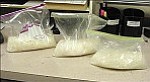Courtesy photo
Officers from Partners Against Narcotic Trafficking (PANT) found these three pounds of methamphetamine in a side compartment of an impounded BMW after a routine traffic stop.
