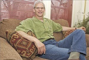 Courier/Nathaniel Kastelic
Psychotherapist Bill Rubin poses comfortably in his Prescott office Friday afternoon.