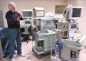 Courier/Les Stukenberg
Biomedical Engineering Supervisor Bob Wilkinson sets up one of the new anesthesiology machines during a media tour of the new Yavapai Regional Medical Center East campus in Prescott Valley.