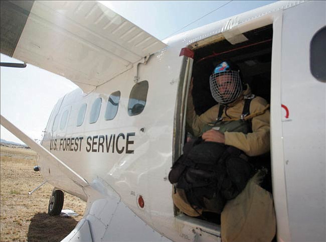 The Prescott Fire Center has a crew of 11 smokejumpers normally 
stationed in Silver City, N.M., pre-positioned here for extra precautions due to the extreme fire 
danger. Crewmember Matt Smith and the others all have more than seven years jumping onto fires and can respond to any fire within about 320 miles of Prescott within two hours.
The Daily Courier/
Les Stukenberg