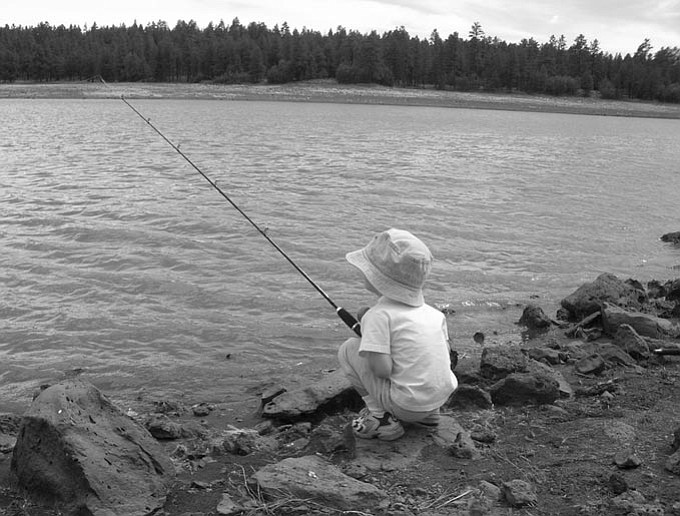 Reader photo/Jack Dale --- Jack Dale's son fishes at Dogtown Lake.