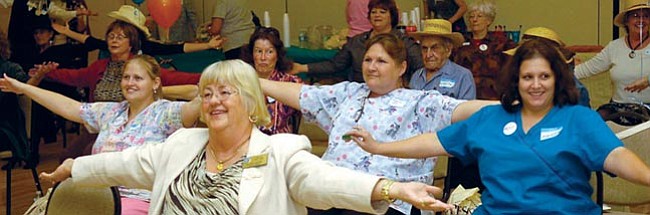The Daily Courier/Jo.L. Keener
Caregivers perform aerobic exercises Tuesday at The Prescott Community Center. Local Arizona Caregivers were honored Tuesday at the center.