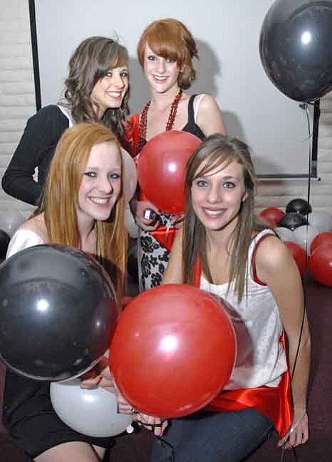 The Daily Courier/Jo. L. Keener<br> 
Birthday girls from left, Ashley, Brandi, back row, Carley and Dawn Heuer celebrate their 16th birthday as they frolic with balloons at Antelope Hills Club House Saturday night. All four turned 16 on Sunday.